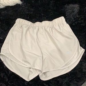 Tan Nike running shorts